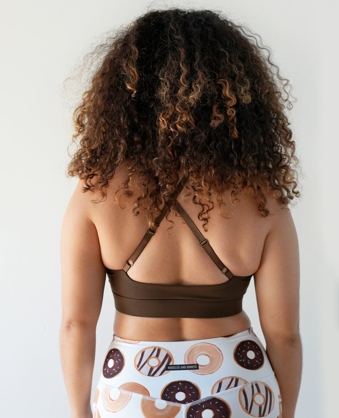 muscles and donuts chocolate sports bra